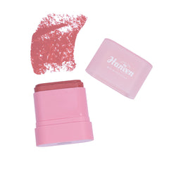 Pink makeup product with swatch on a white background