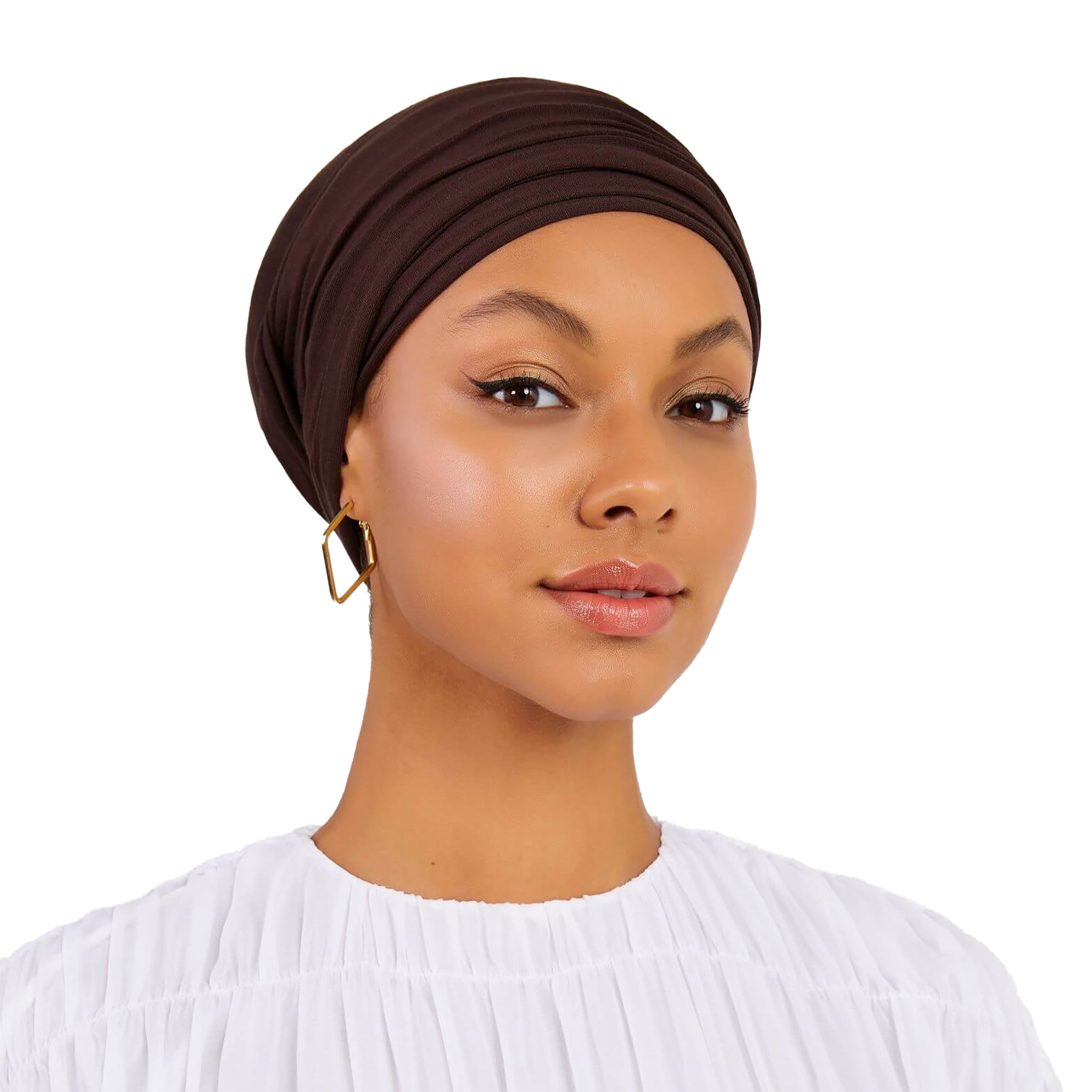 Woman wearing a brown headscarf on a white background