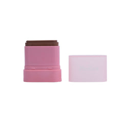Pink cosmetic stick with brown top on a white background