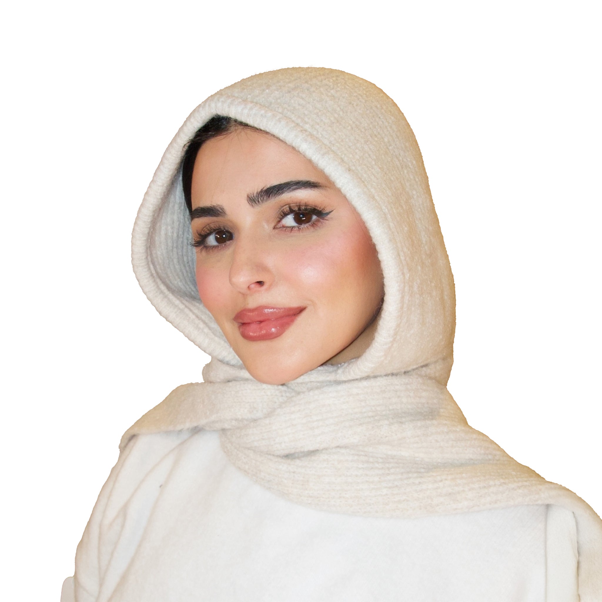 Woman wearing a beige hijab on a white background