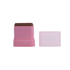 Pink cosmetic stick with brown top on a white background