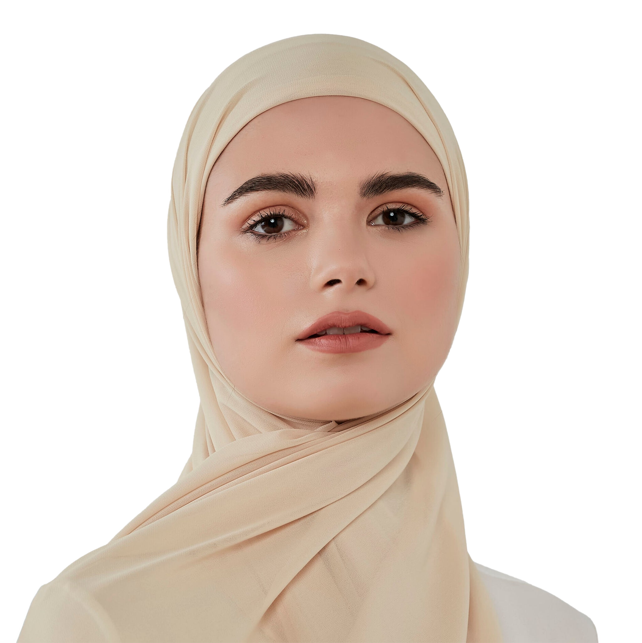 Woman wearing a beige hijab against a white background