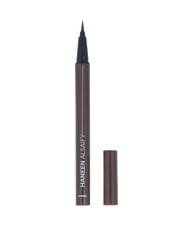 A Haneen Alsafny liquid eyeliner pen in a dark brown shade, shown with its cap off and standing next to the pen on a solid white background.