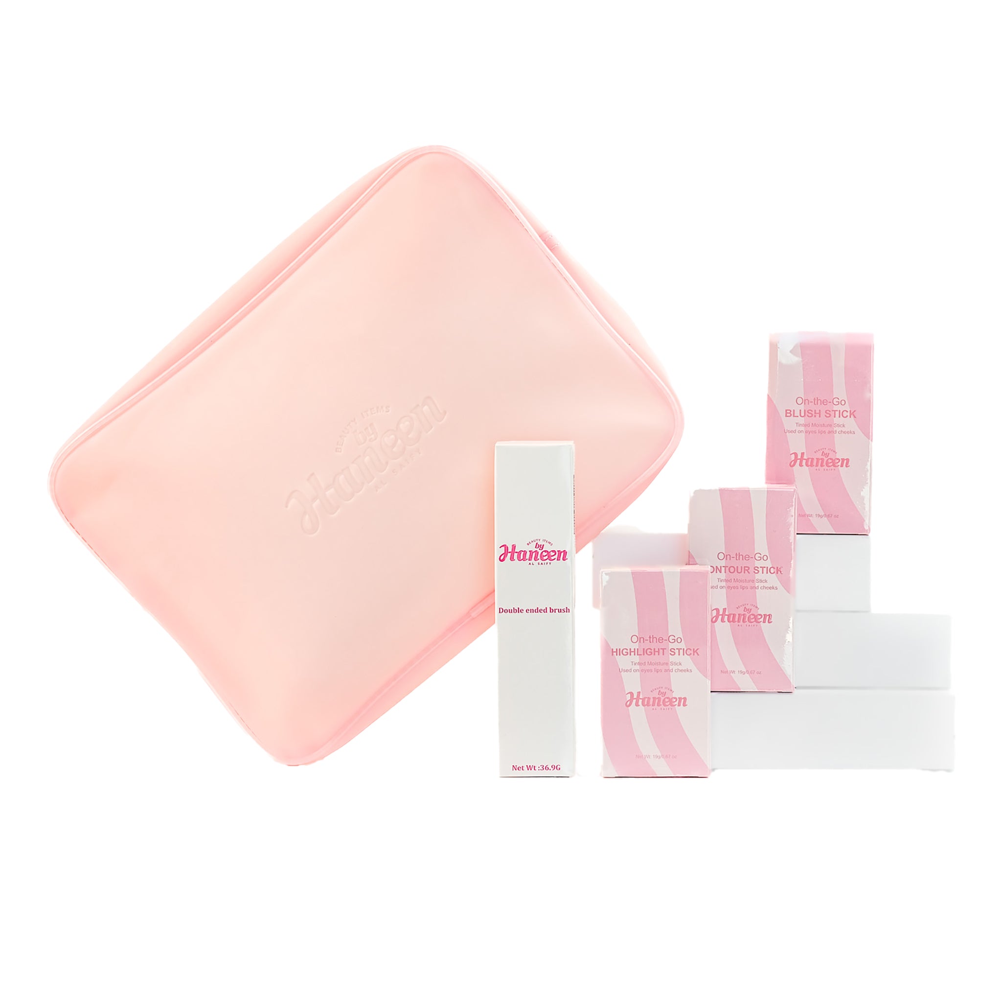 Set of skincare products with pink and white packaging on a white background