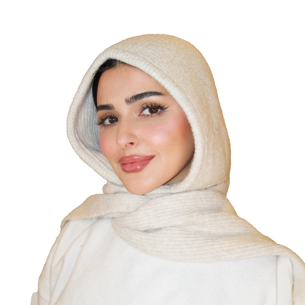 Woman wearing a beige hijab on a white background
