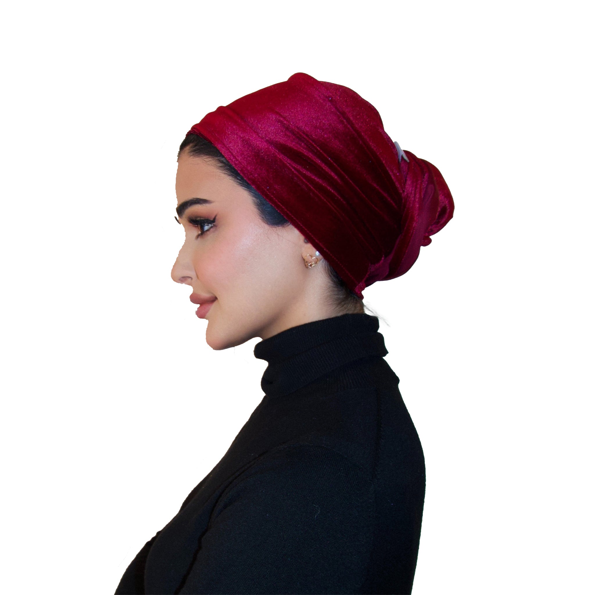 Woman wearing a red headscarf on a white background