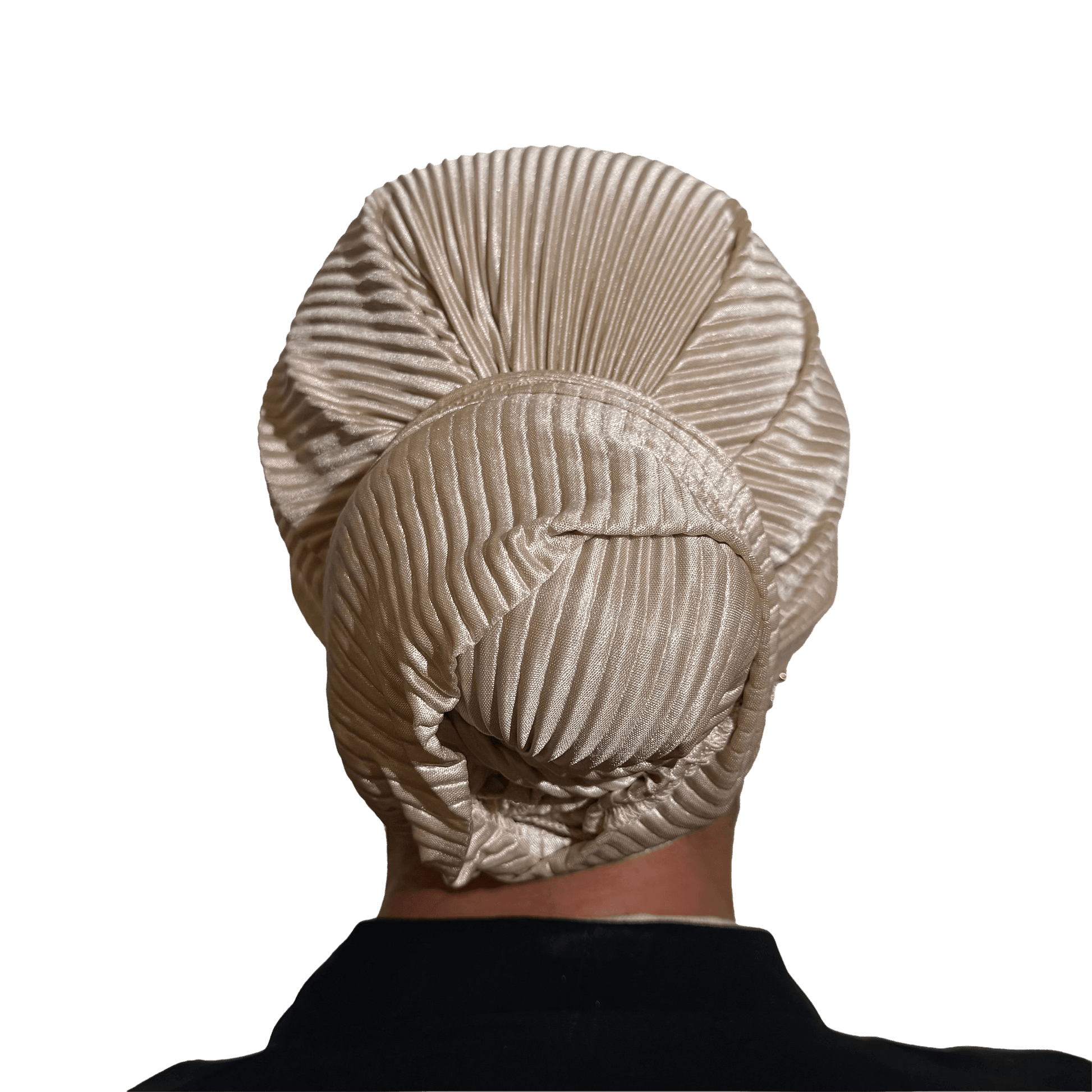 A beige pleated silk-like hairpiece or wig cap shown from the back on a person against a solid black background.