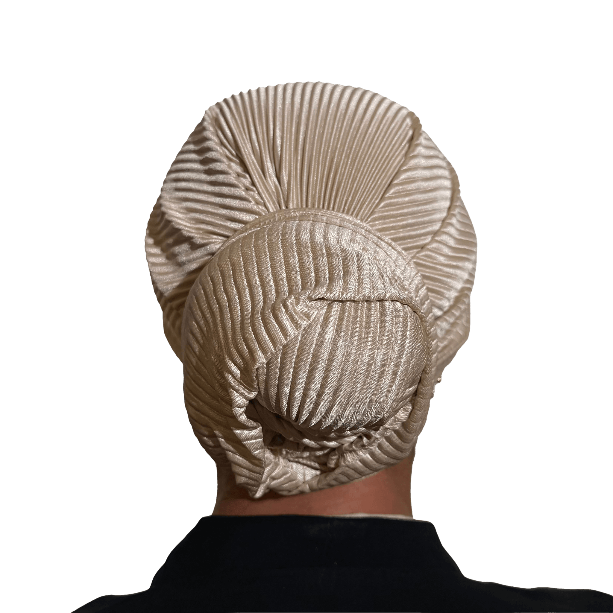 A beige pleated silk-like hairpiece or wig cap shown from the back on a person against a solid black background.