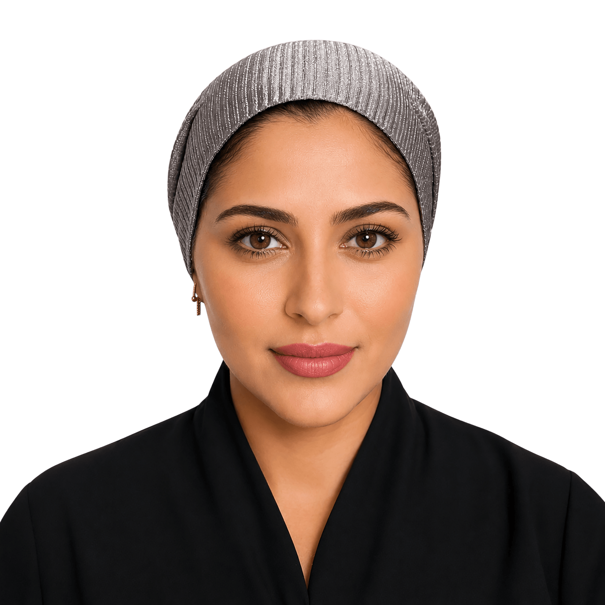 A woman wearing a gray ribbed knit head covering and a black garment, shown from the chest up against a solid black background.