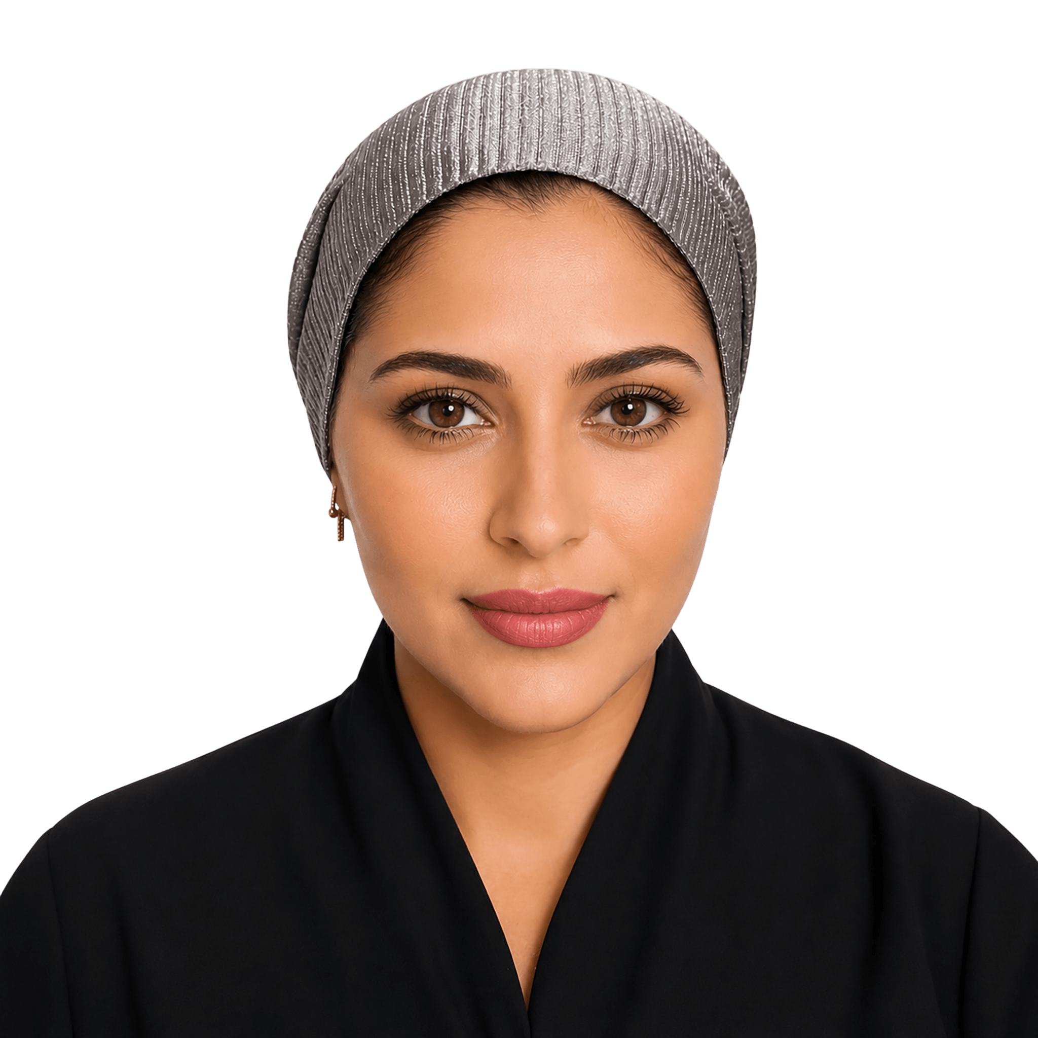 A woman wearing a gray ribbed knit head covering and a black garment, shown from the chest up against a solid black background.