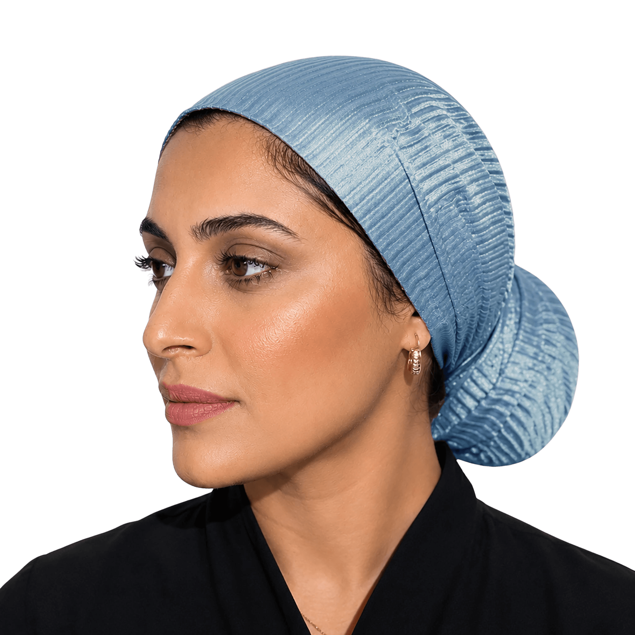 A woman shown in profile wearing a light blue textured fabric head covering or hijab against a solid black background.