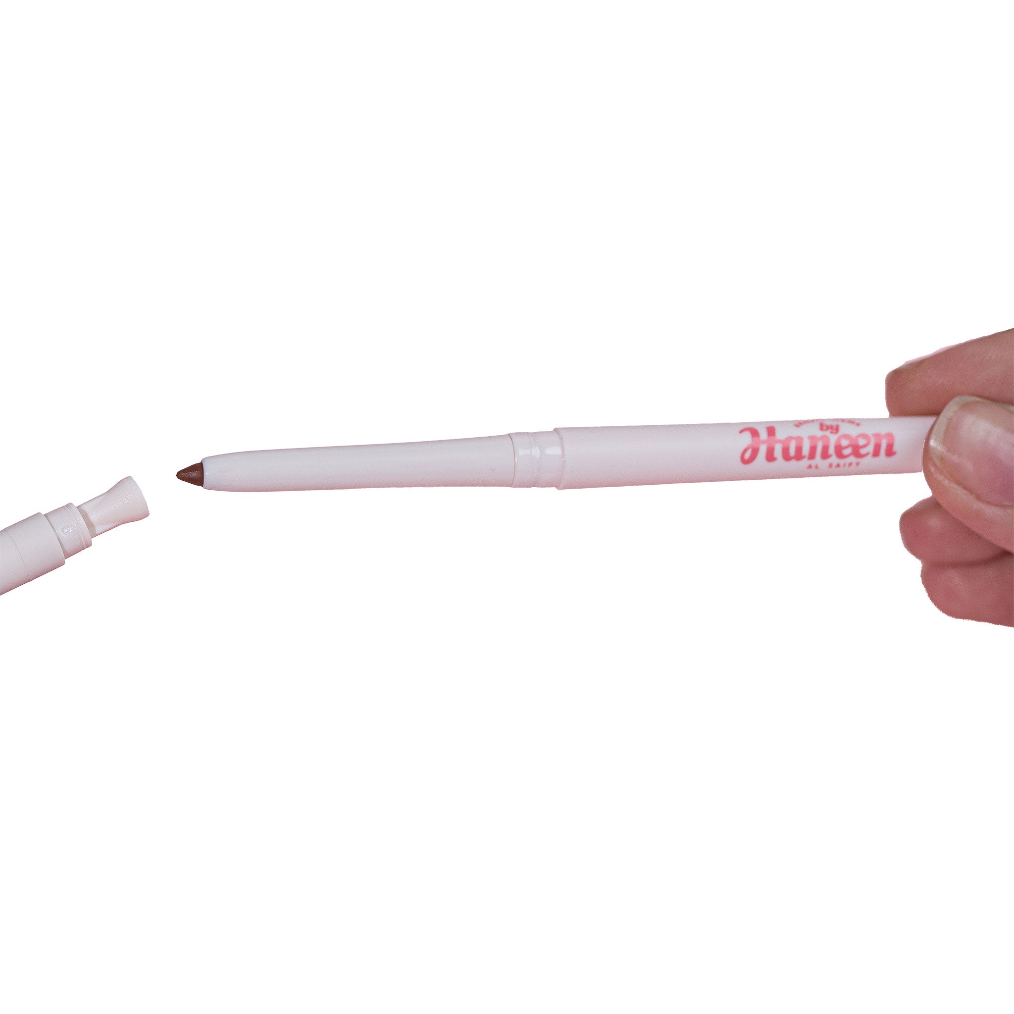White pen with 'Helen' branding held by a hand on a white background