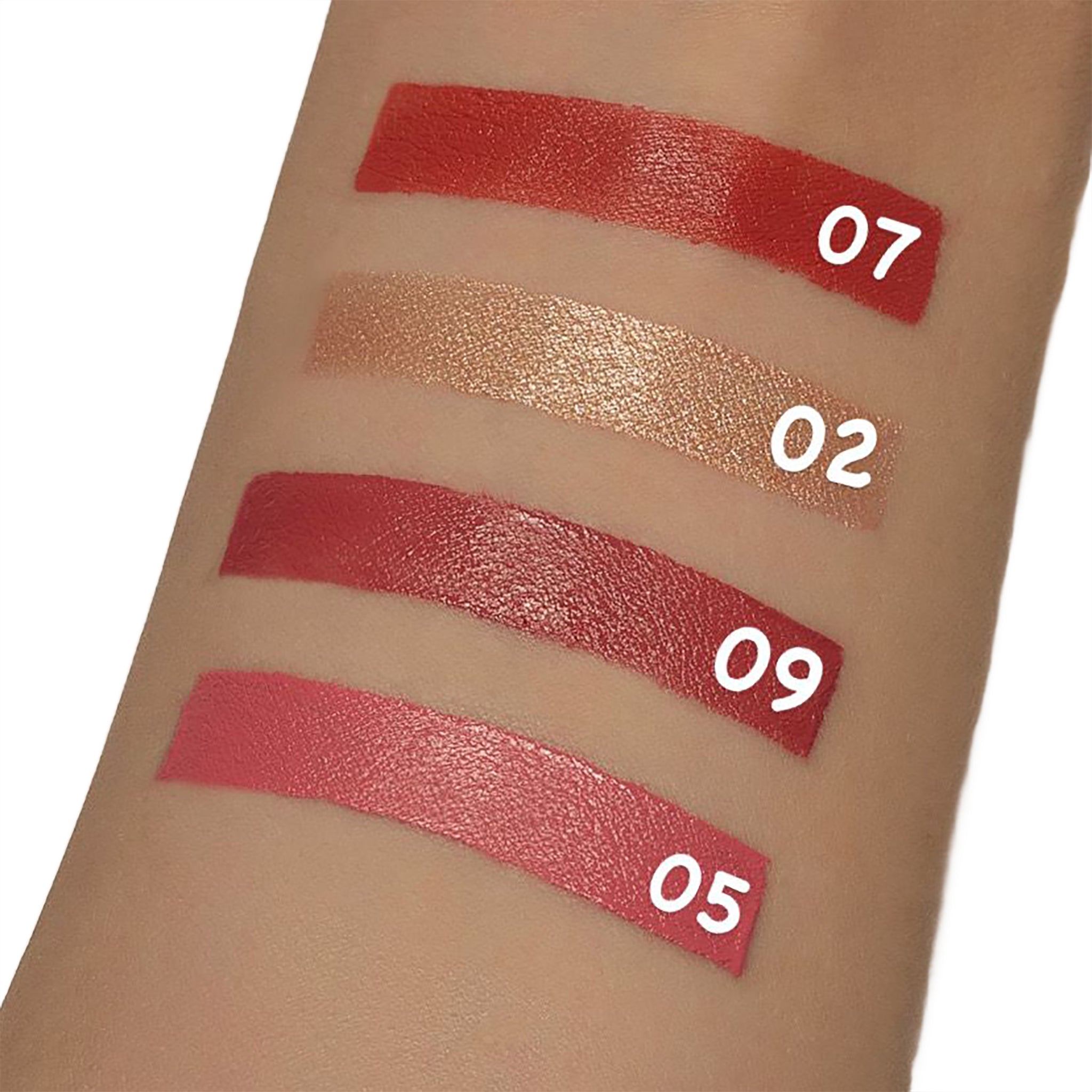 Lipstick swatches on a person's arm with color numbers