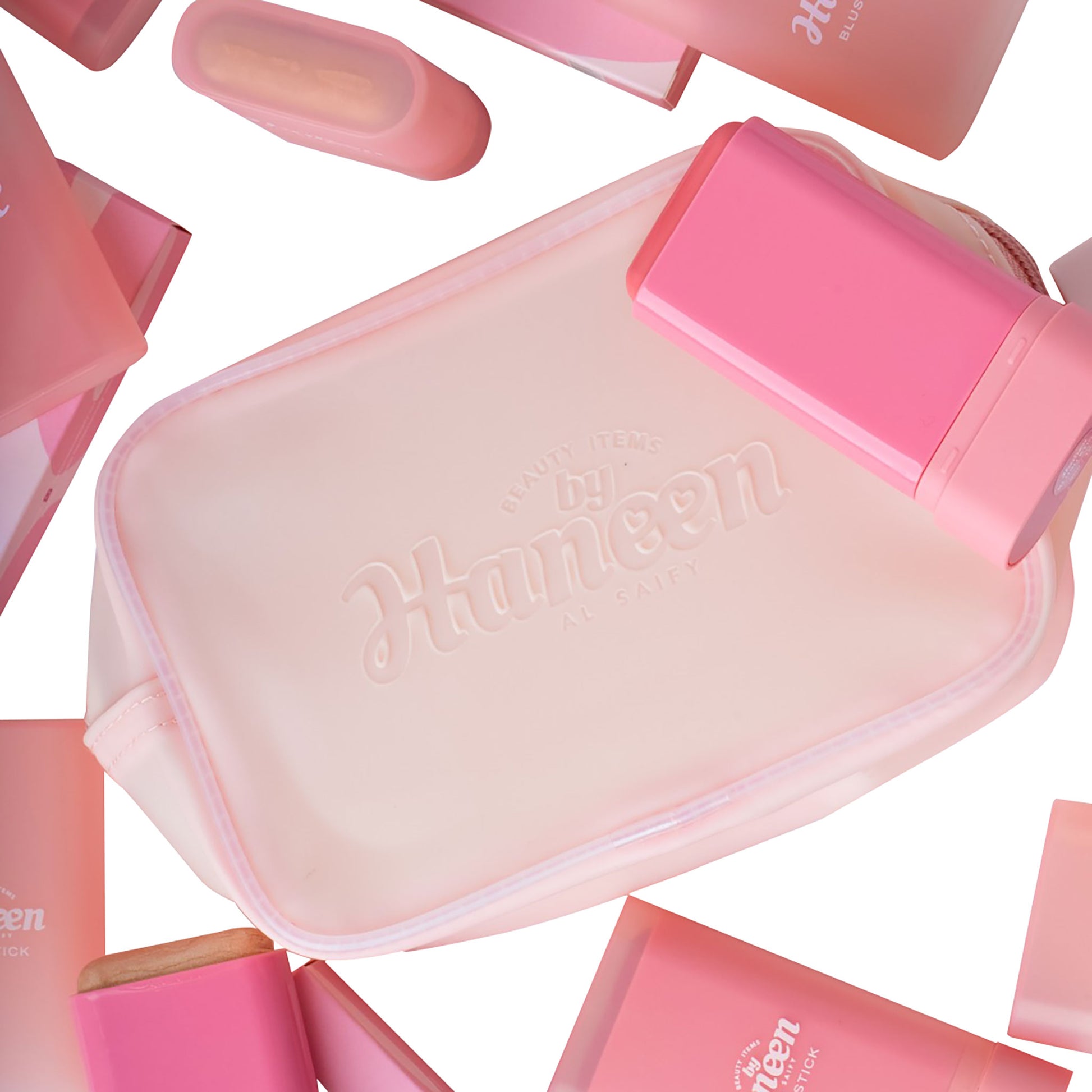 Pink and white cosmetic bag with 'Mistine' branding on a white background