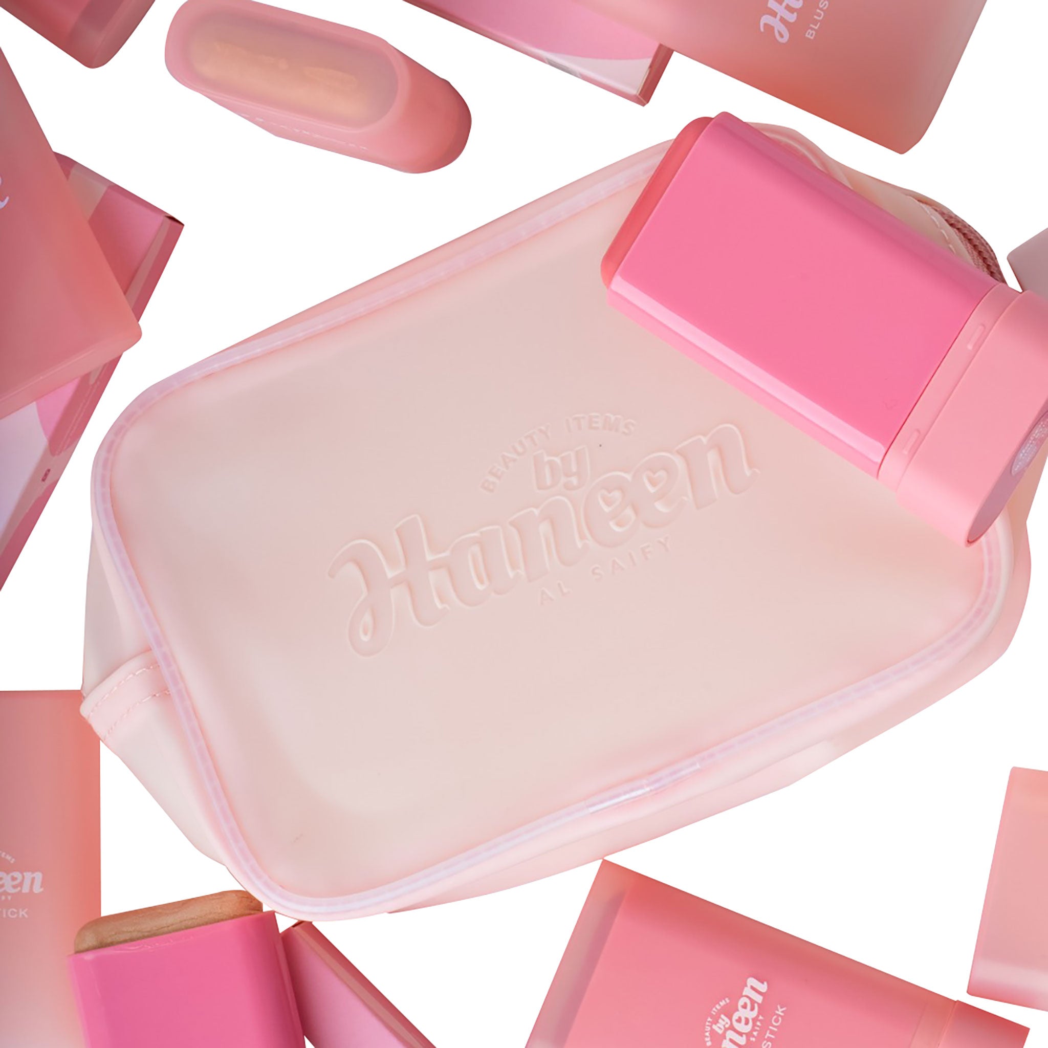Pink and white cosmetic bag with 'Mistine' branding on a white background