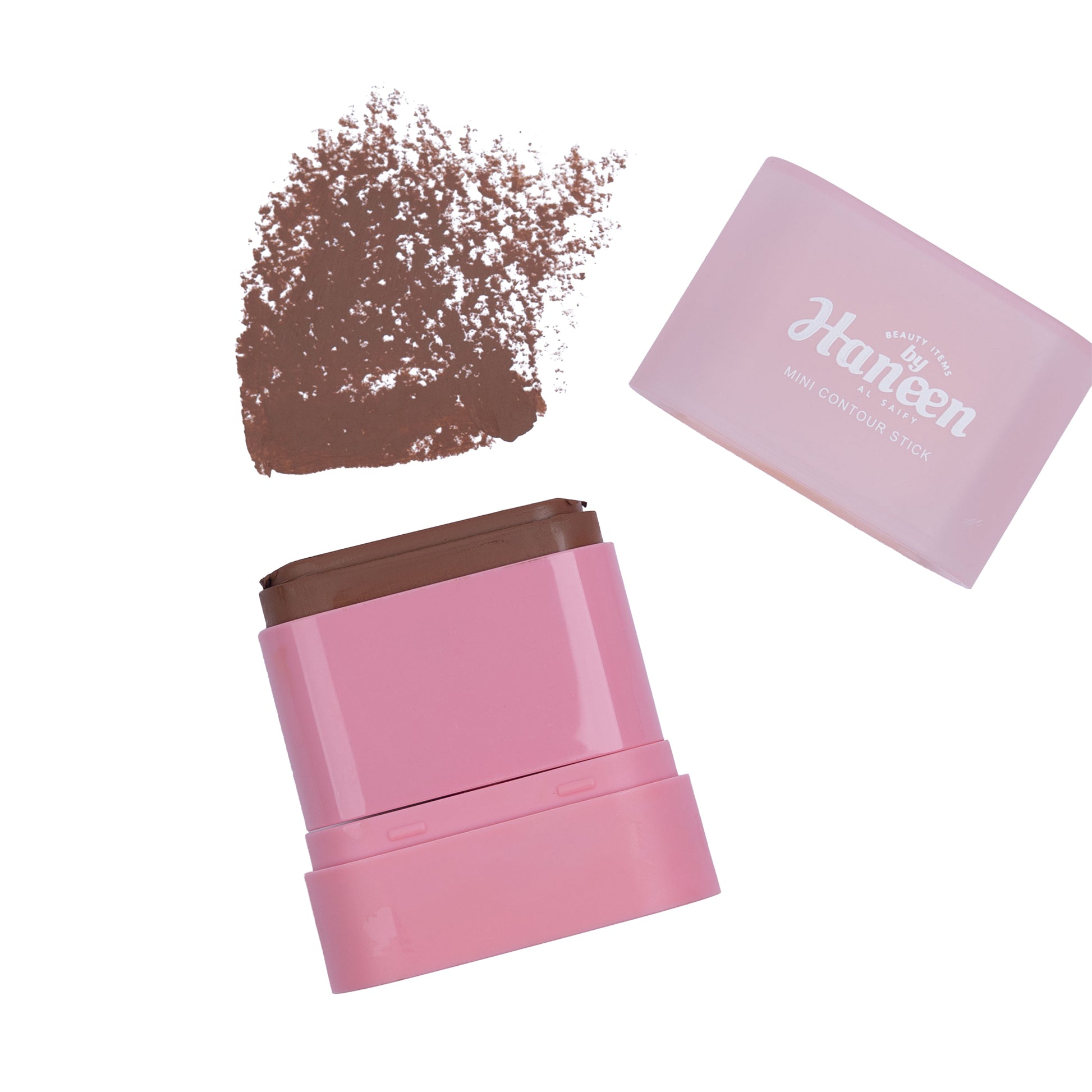 Pink makeup stick with brown powder and 'Lush' branding on a white background
