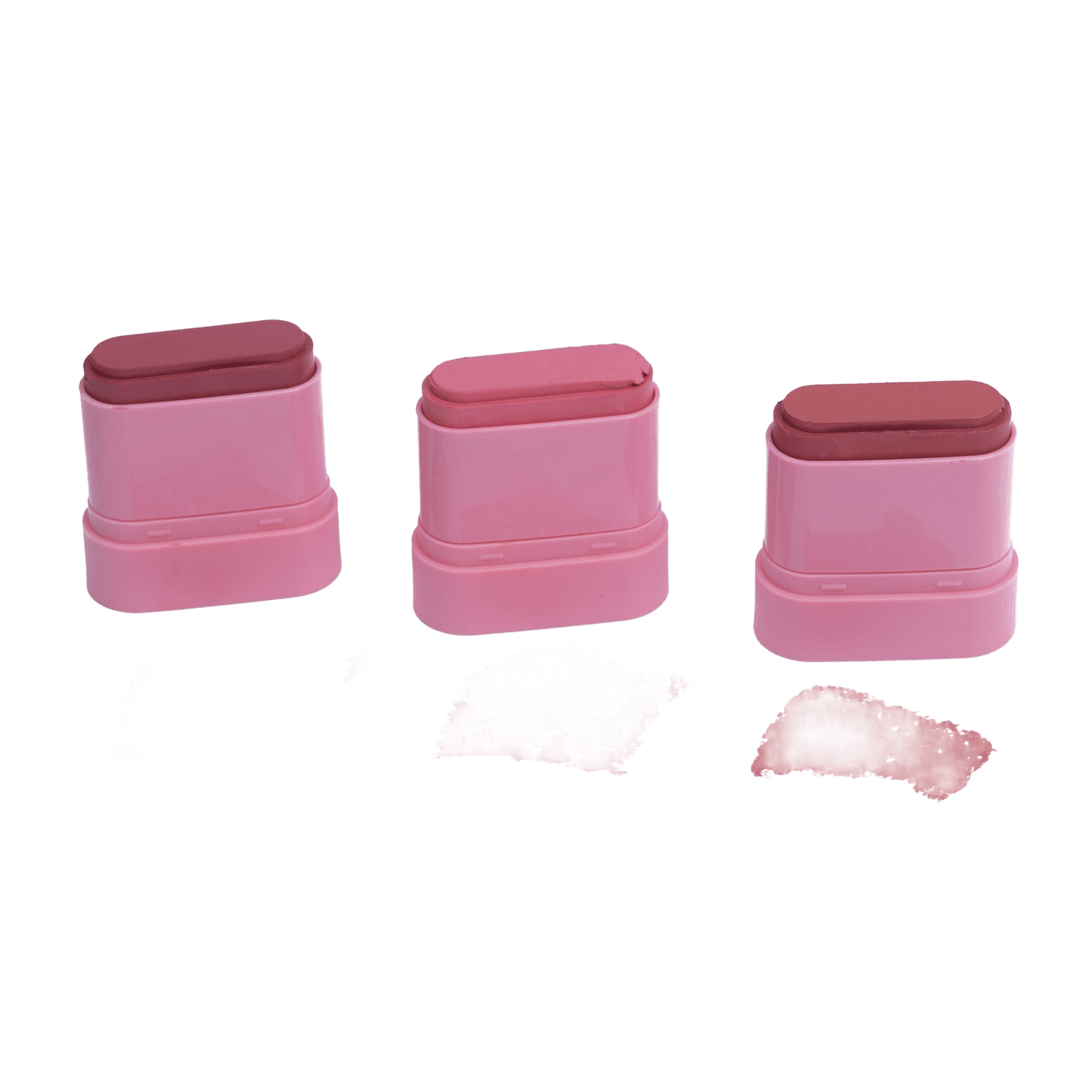 Three pink makeup tins with lip powder samples on a white background