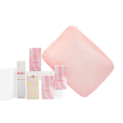 Set of pink and white skincare products with a pink square item on a white background