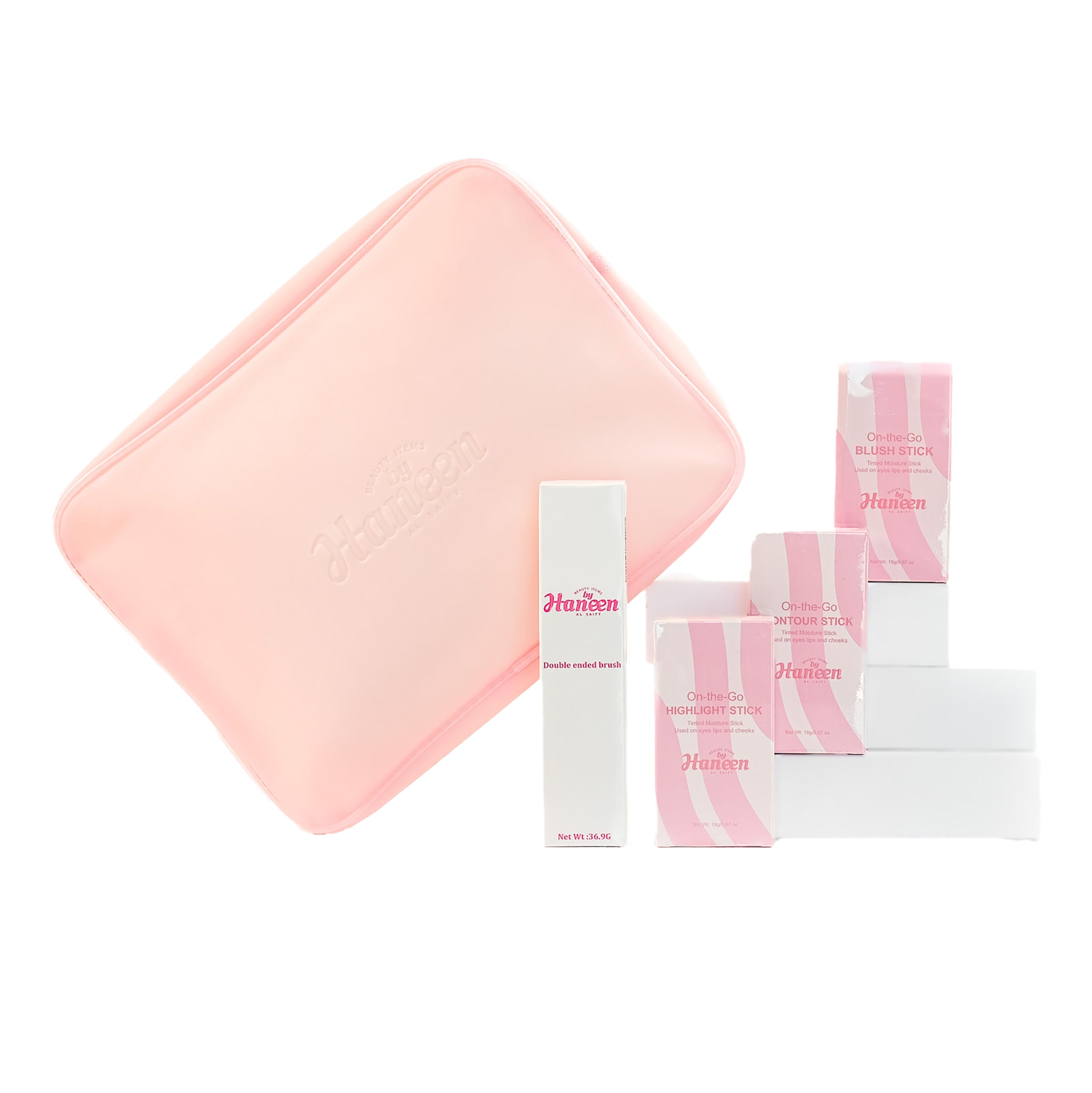 Set of skincare products with pink and white packaging on a white background