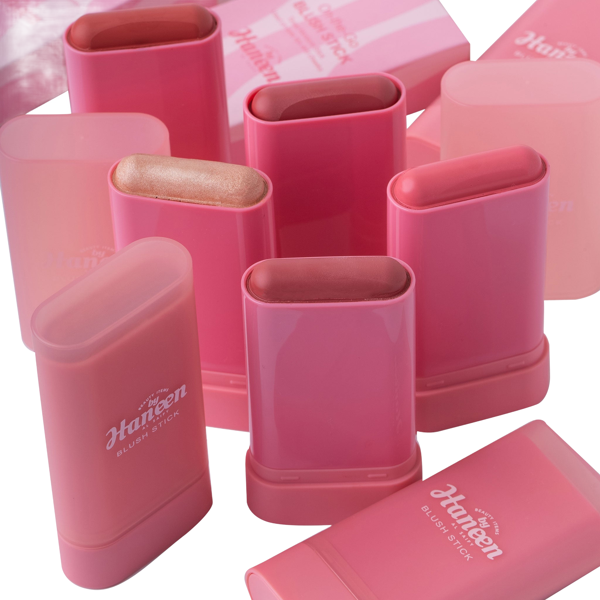 Pink Huppen lip balm containers on a white background