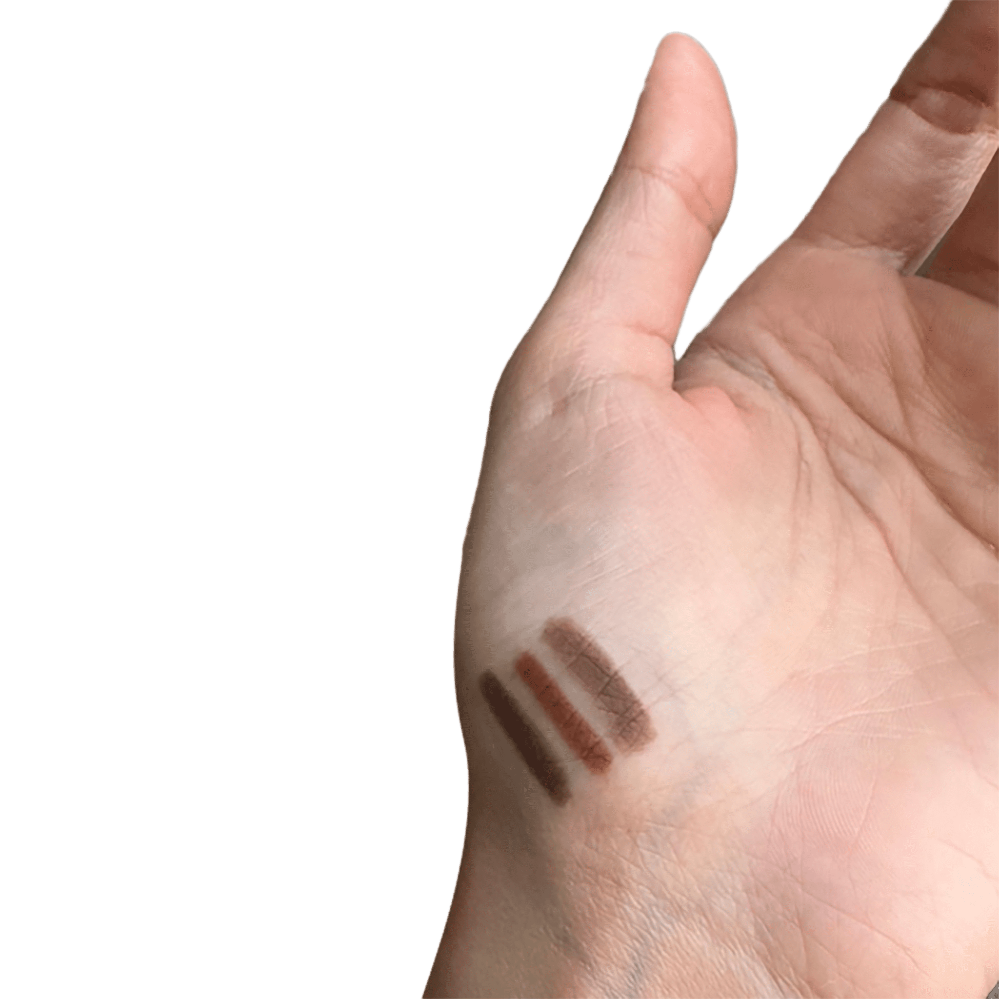 Two makeup swatches on a person's hand with a white background