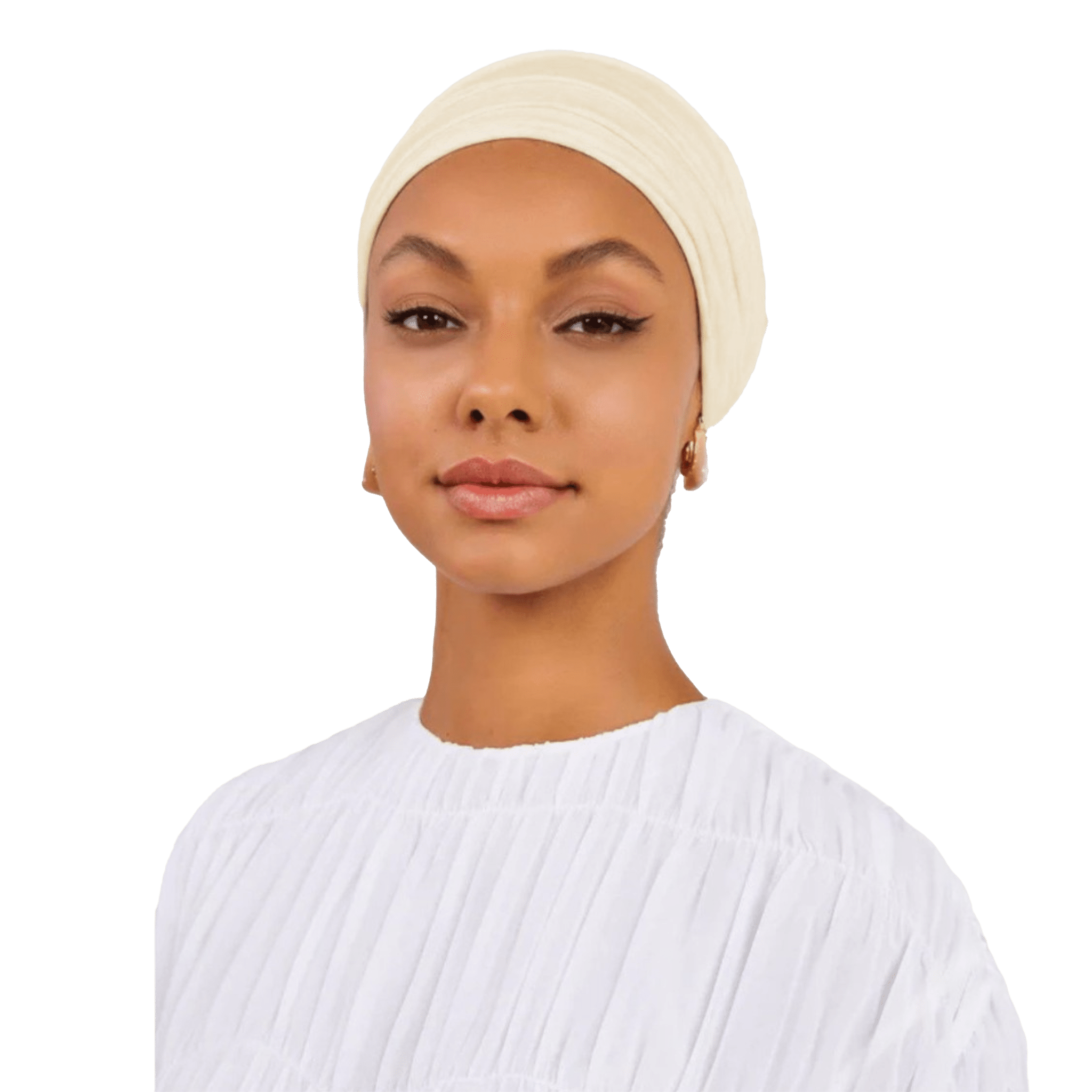 Woman wearing a beige headscarf and white top on a white background