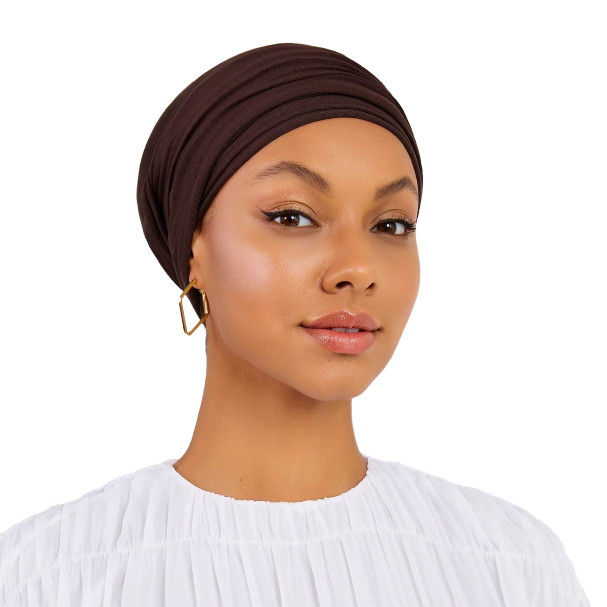 Woman wearing a brown headscarf on a white background