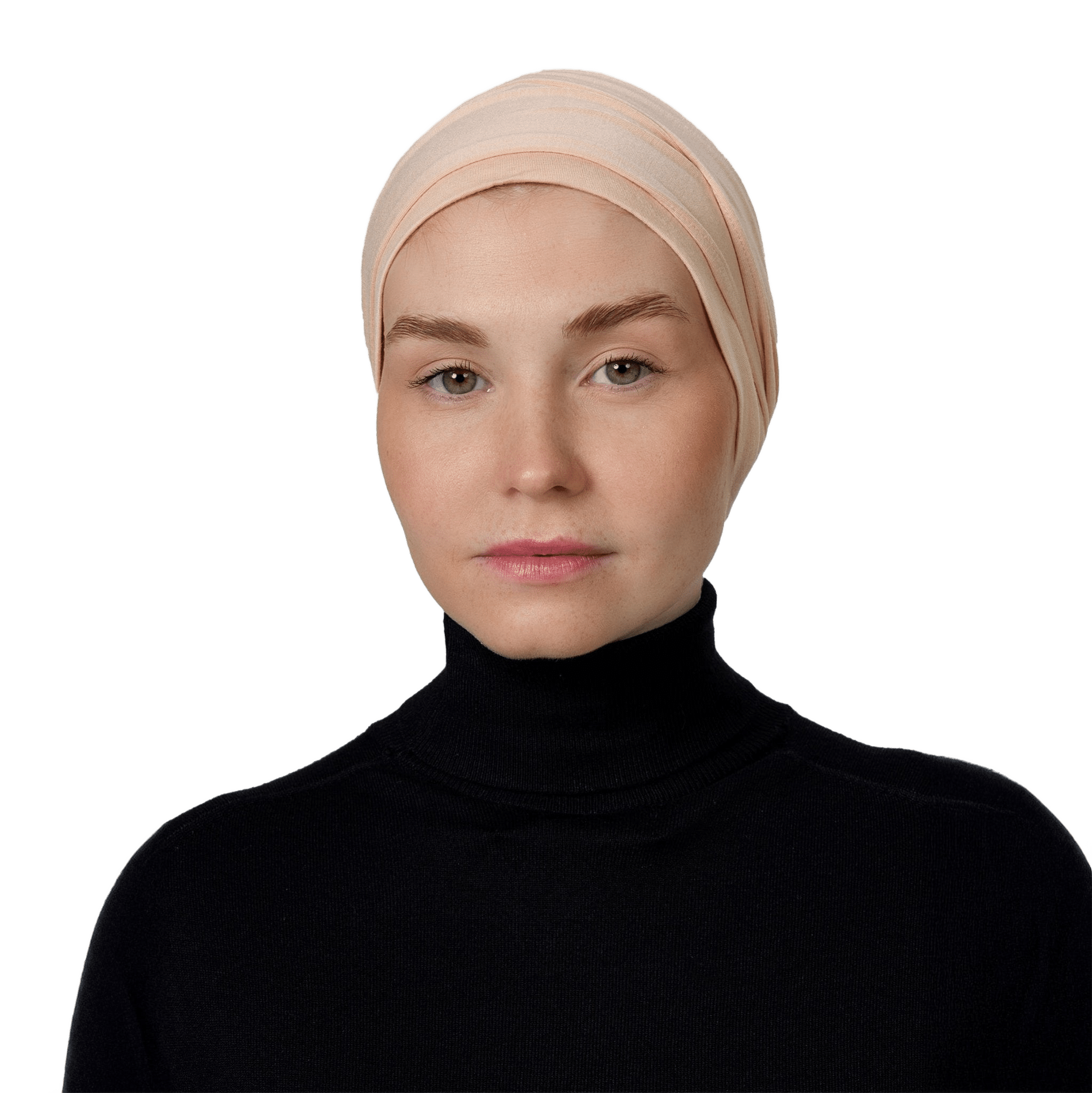 Woman wearing a beige headscarf on a white background