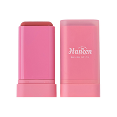 Pink blush stick with packaging on a white background