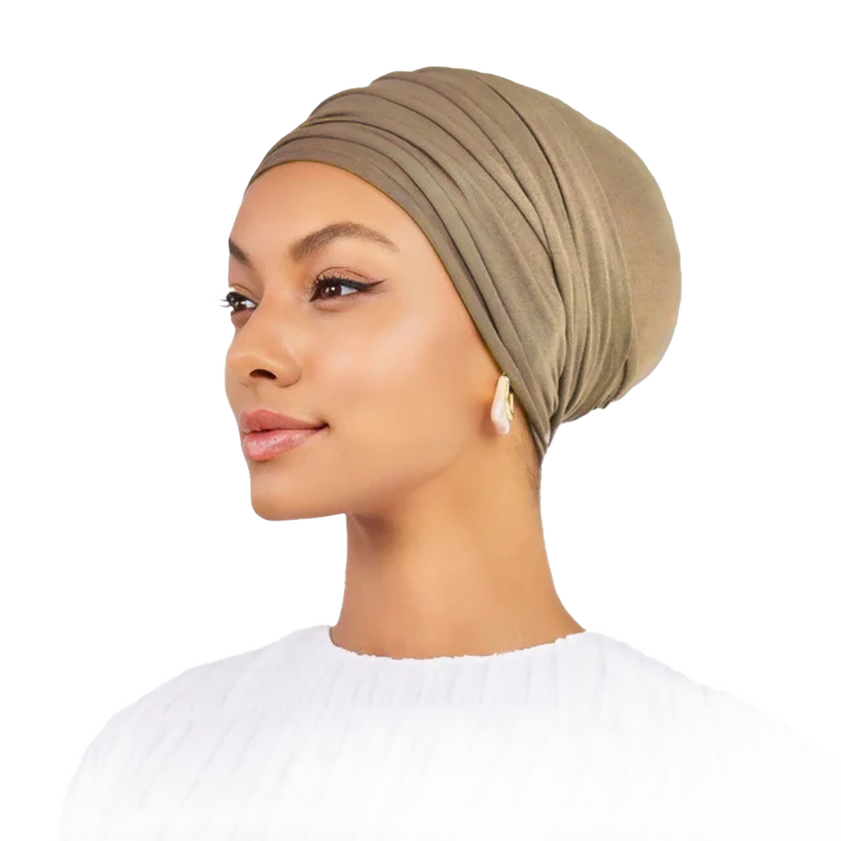 Woman wearing a beige headscarf on a white background