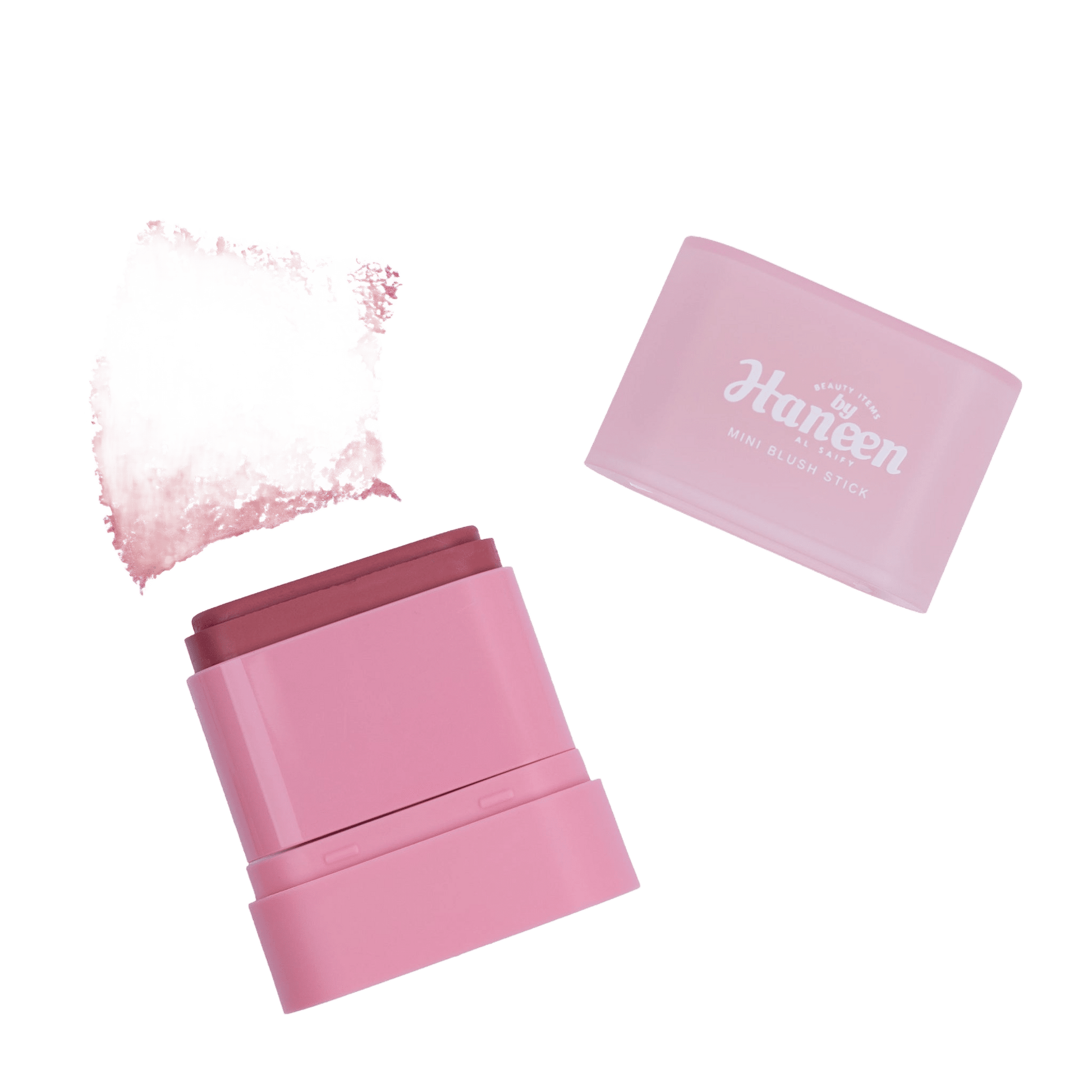 Pink makeup product with open case and sample on a white background