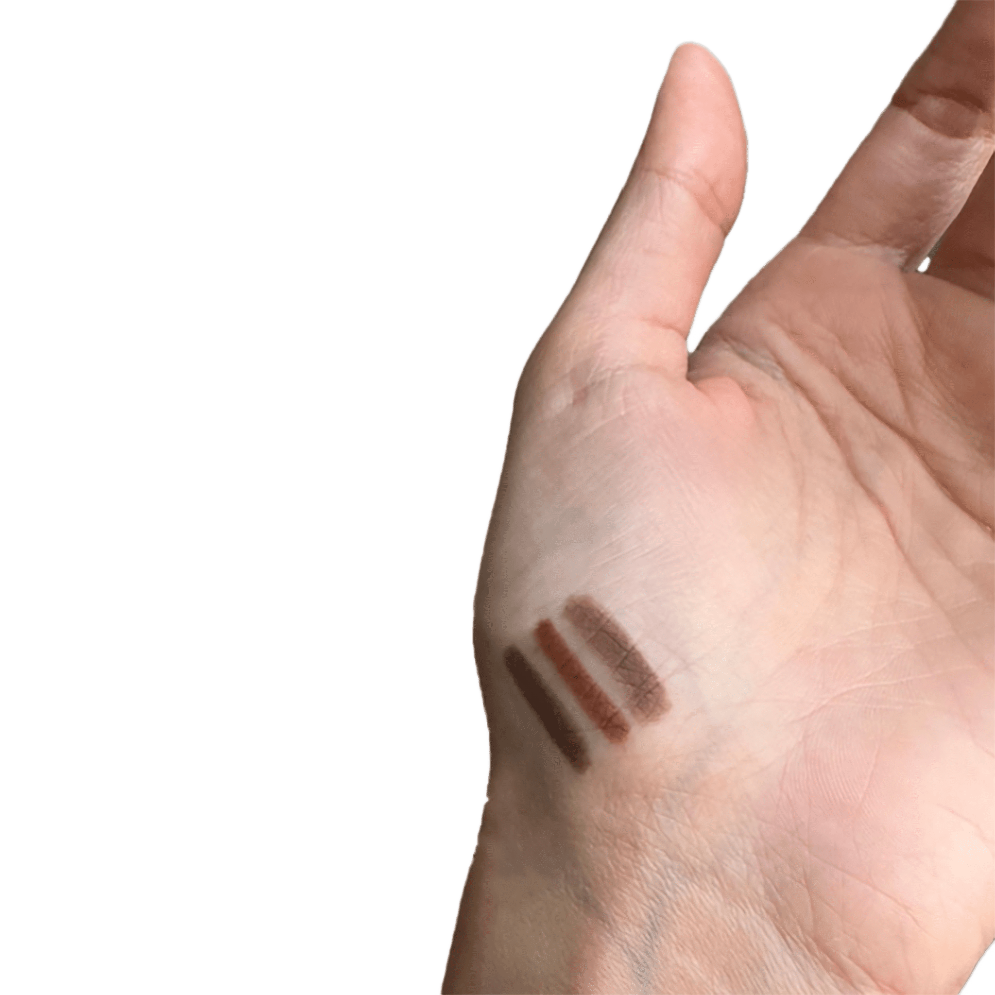 Two brown makeup swatches on a person's hand against a white background