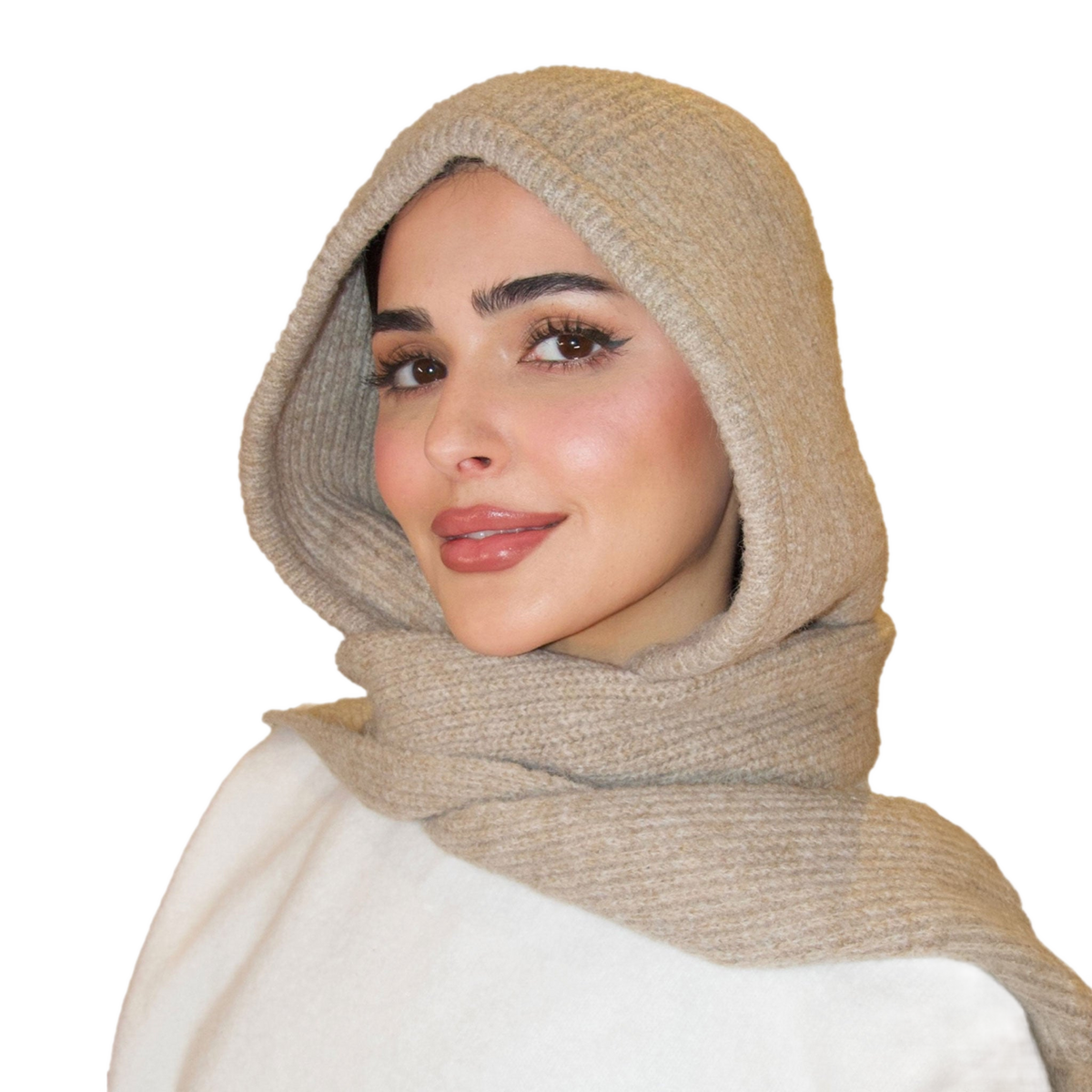 Woman wearing a beige hijab on a white background