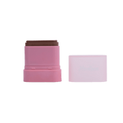 Pink cosmetic stick with brown top on a white background