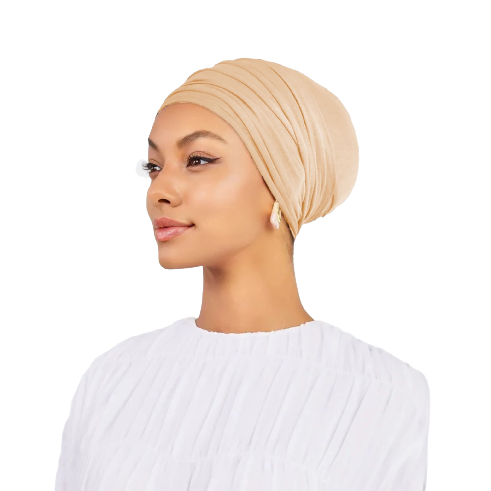 Woman wearing a beige headscarf on a white background