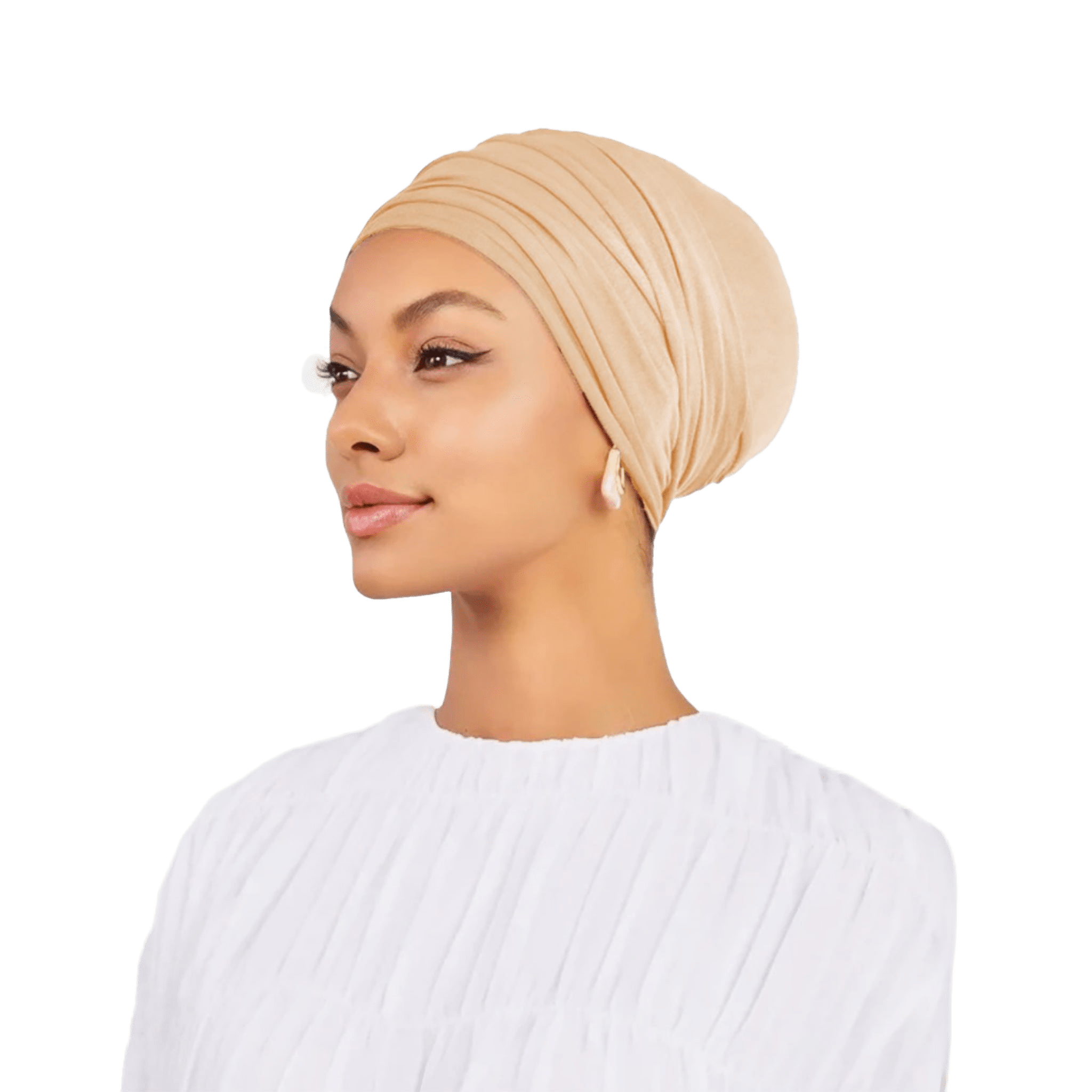 Woman wearing a beige headscarf on a white background