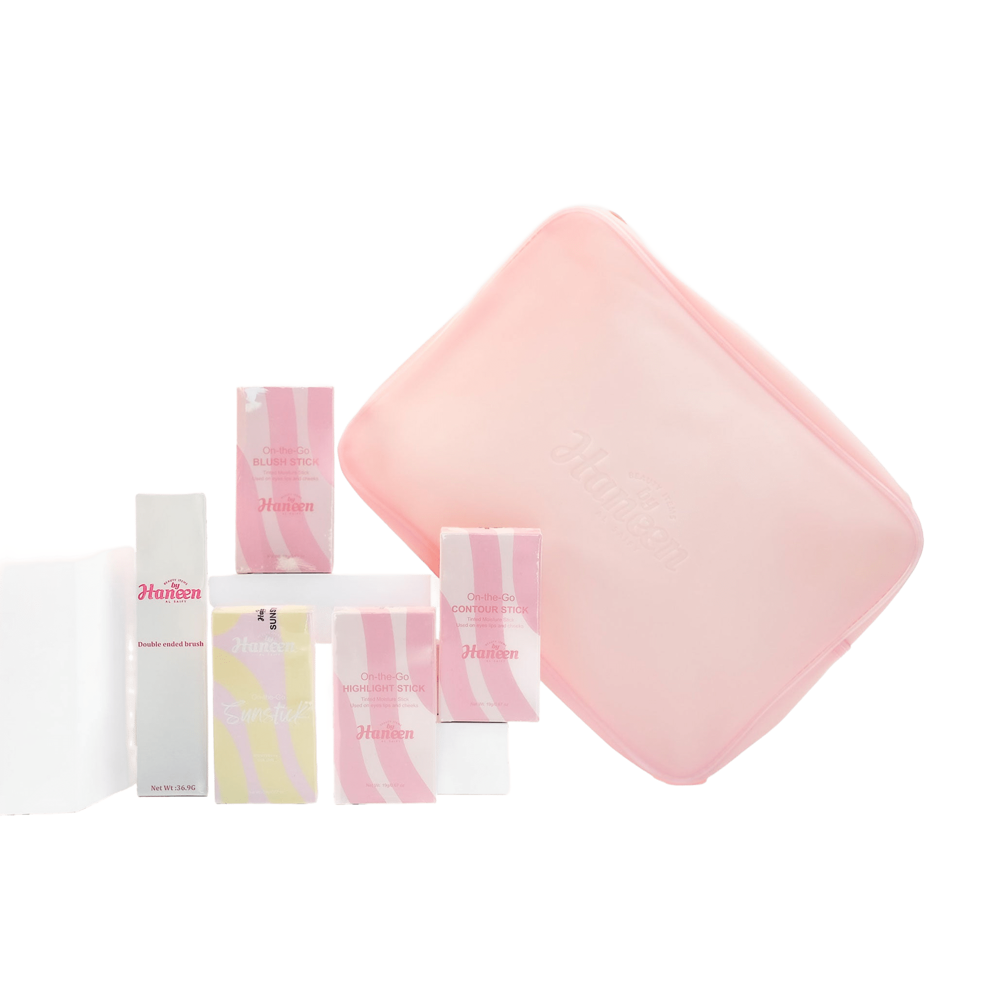 Set of pink and white skincare products with a pink square item on a white background