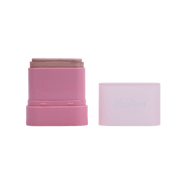 Pink makeup stick with a white cap on a white background