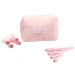 Pink pouch with Haneen branding and pink tubes on a white background