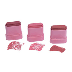 Three pink makeup tins with lip powder samples on a white background